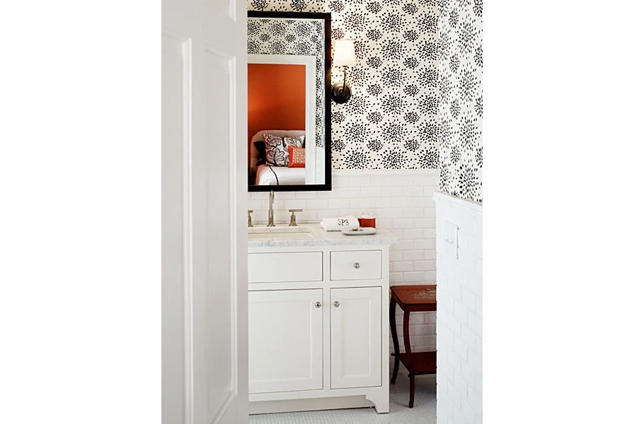 Powder Bath with Subway Tile and Black and White Wallpaper via Barrie Benson