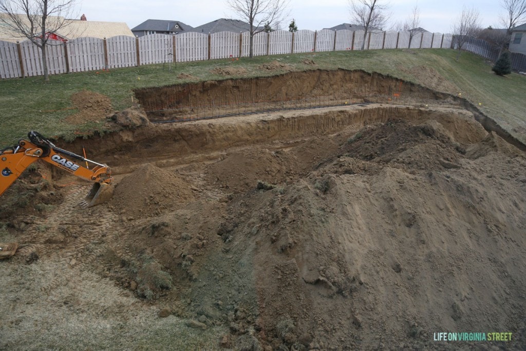Backyard with both walls dug out
