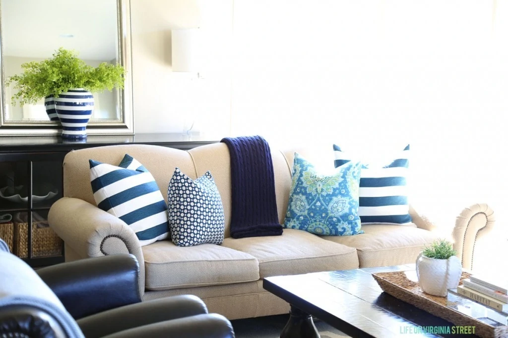 Spring Living Room with Navy Stripes and Turquoise and Green Accents via Life On Virginia Street
