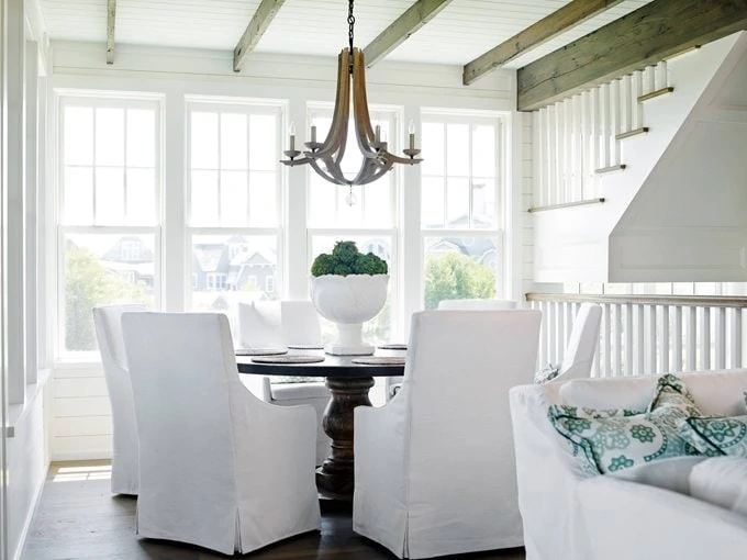 White Dining Room in a Florida New-England Style Home via House of Turquoise