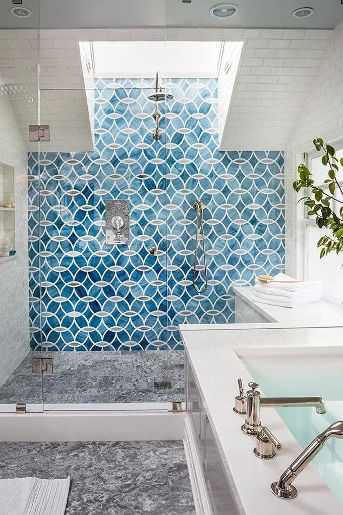 Blue patterned shower tile via House of Turquoise & Massucco Warner Miller Interior Design