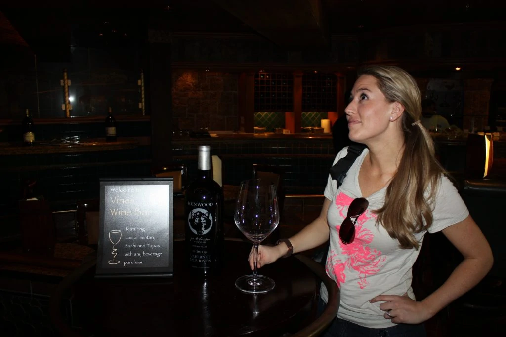 Sarah posing with an extra large wine glass.