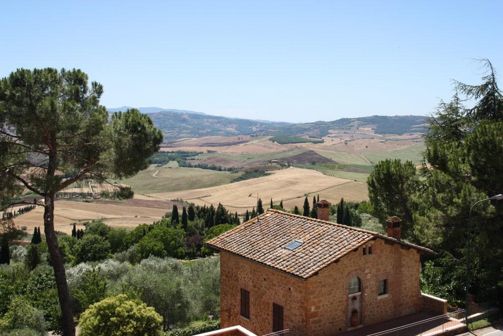 Tuscany Italy with rolling hills.