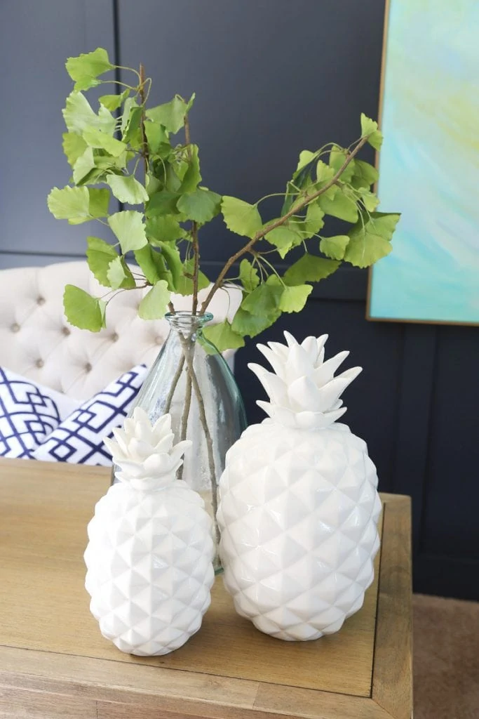 Office Desk Styling with Pineapples, Recycled Glass Vase and Gingko Leaves.
