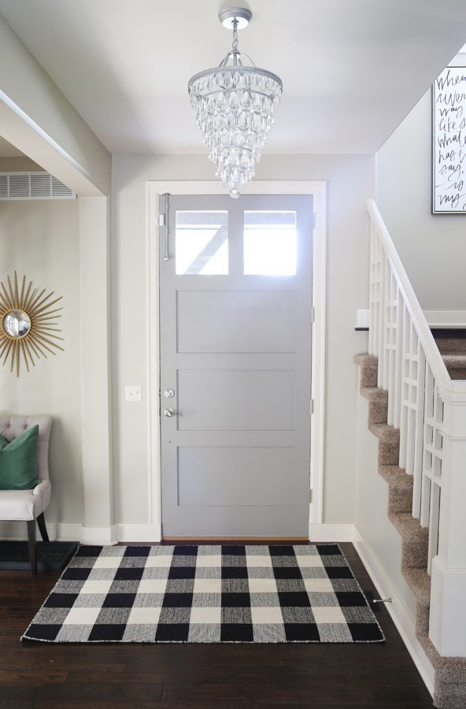 fall-entryway-with-buffalo-check-rug-and-green-velvet-pillow