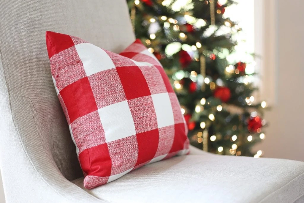 red-and-buffalo-check-pillow-in-a-christmas-dining-room-via-life-on-virginia-street
