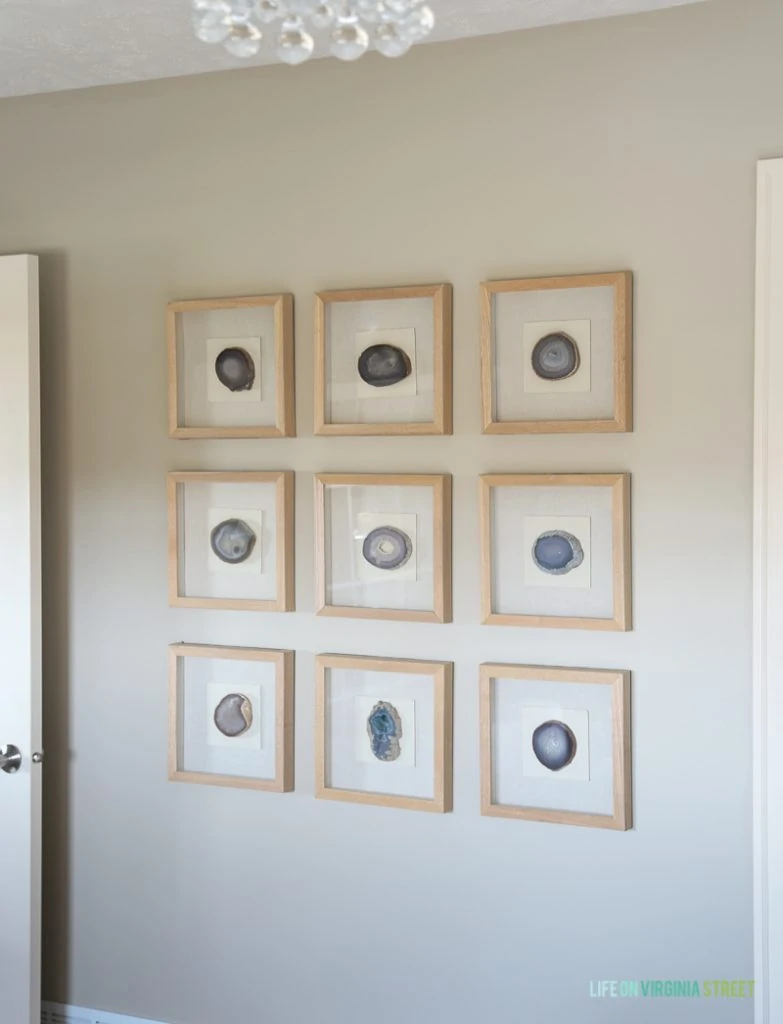 Agate framed gallery wall in a guest bedroom.