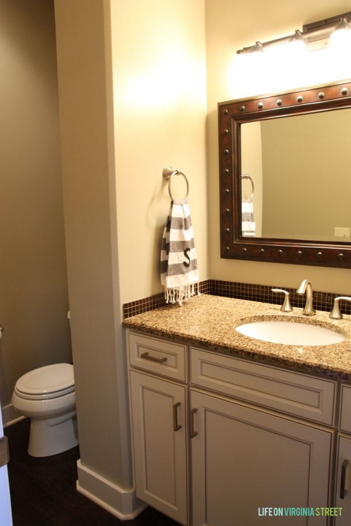 Our powder bathroom shortly after we moved in! It turned out to be darker and more dreary than I had intended and is in much need of an update!