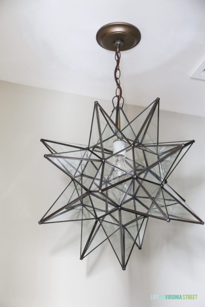 Moravian Star light fixture in a powder bathroom.