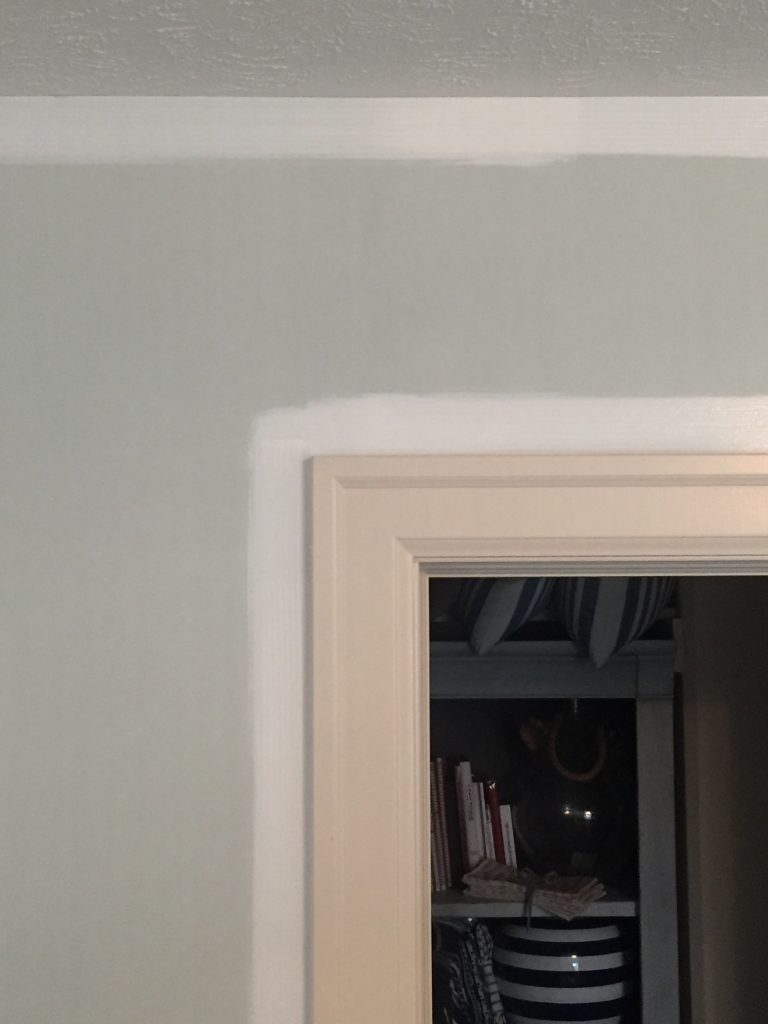 The first parts of painting in progress. You can see from the white paint how not-white our trim is.