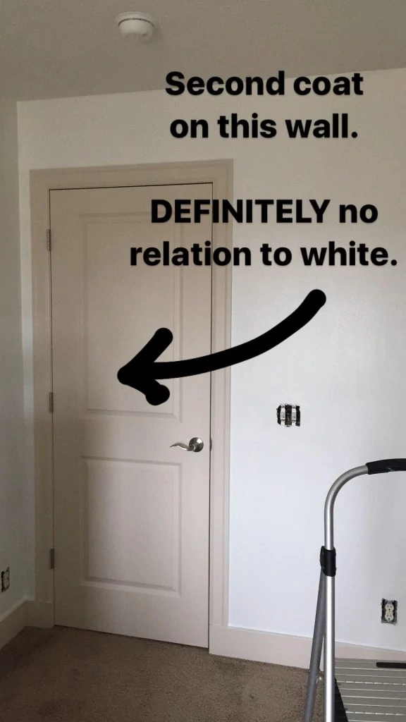See the contrast between the new paint - Benjamin Moore's simply white - and this door that is definitely a cream color.