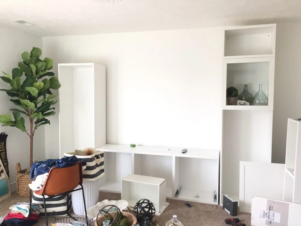 The craft room is a mess right now, but I'm loving the new Benjamin Moore simply white I painted on the walls. And the IKEA Besta is going to be perfect in this room. 