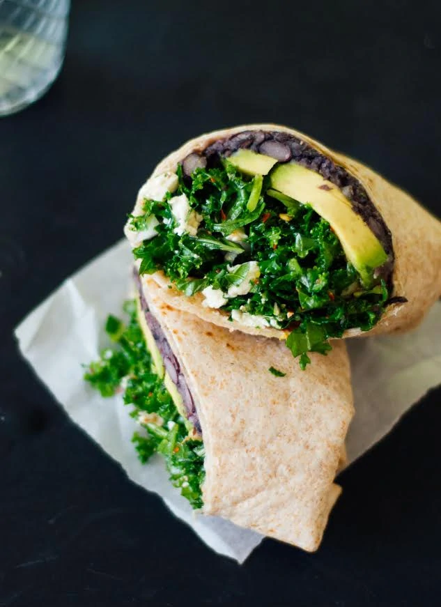 A kale burrito wrap with avocado.