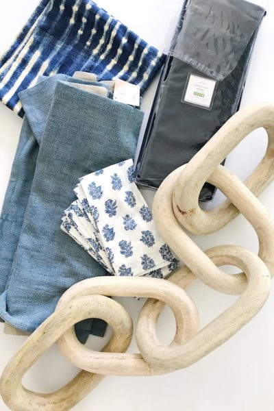 Large wooden chain and blue and white textiles