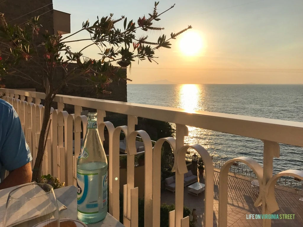 A restaurant patio looking at the setting sun.