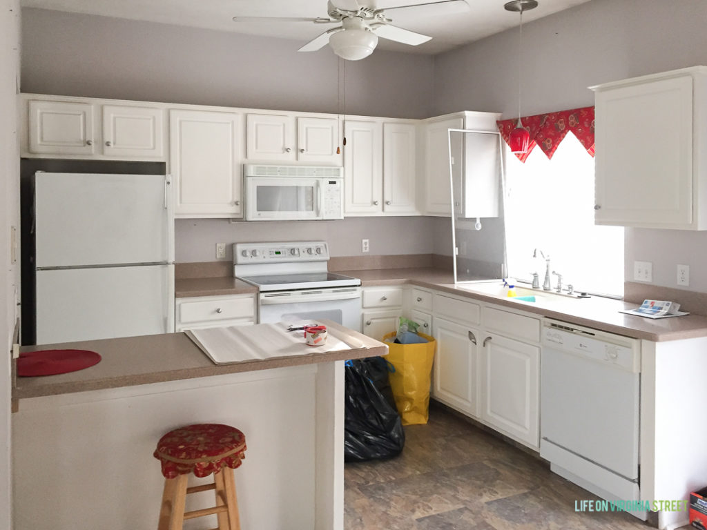 White cupboards, in the kitchen.