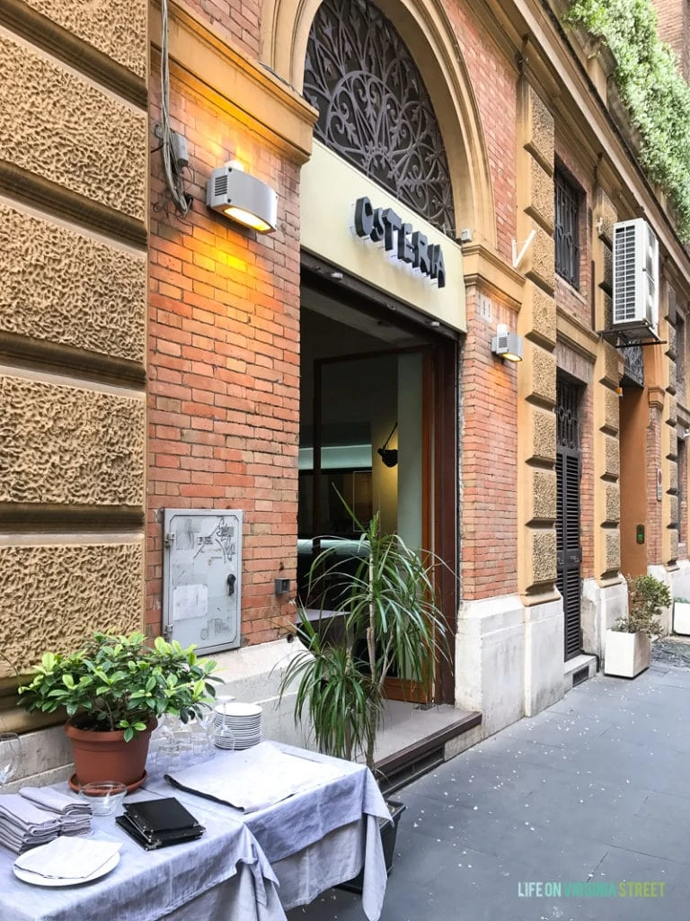 The front of the Osteria restaurant with stone work.