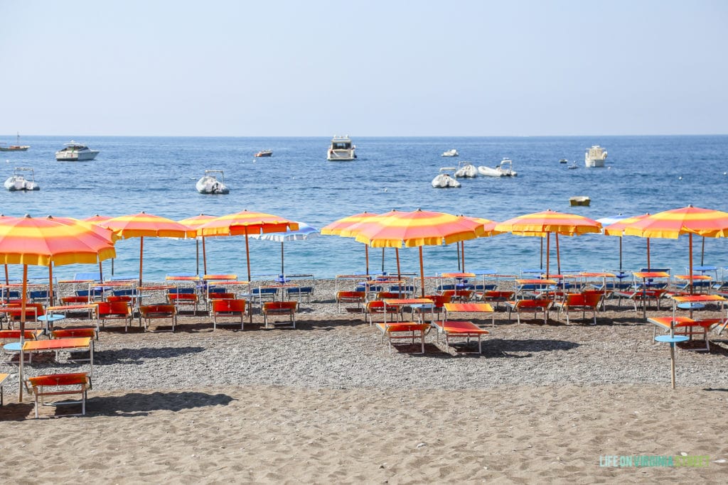 The beach area with chairs and beach umbrellas.