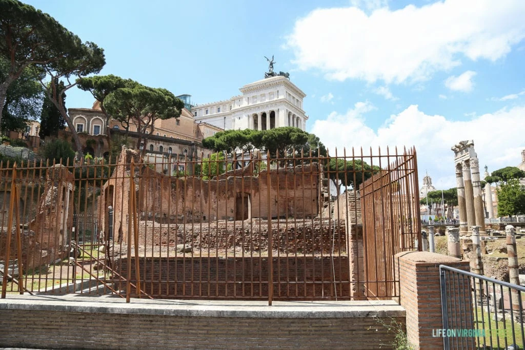 An iron gate on the entrance to the building in Rome.