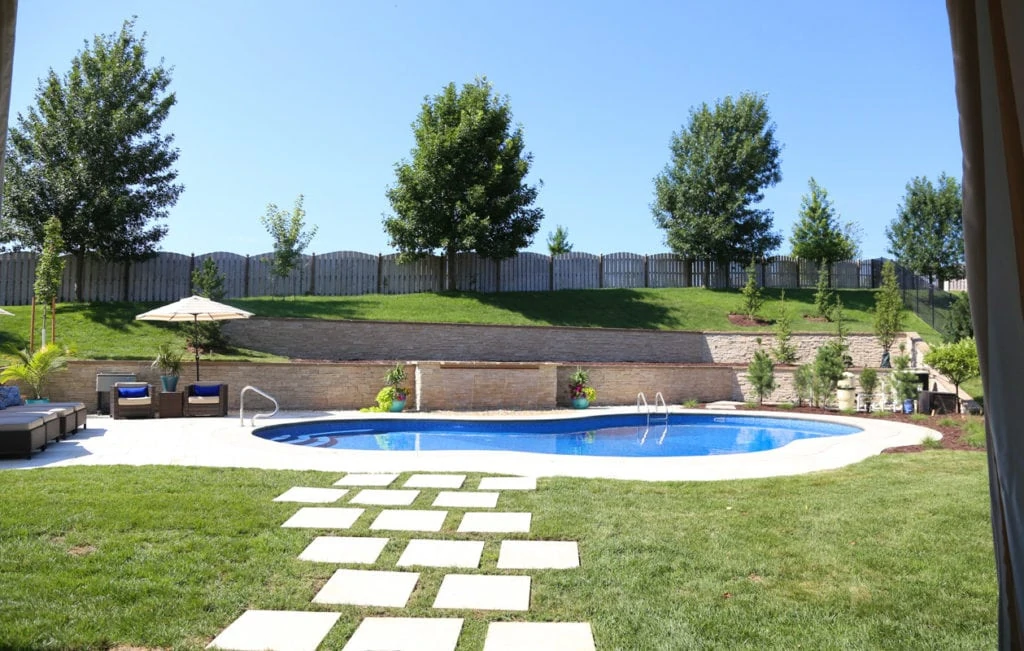 Here's our beautiful backyard pool before we finished the landscaping.