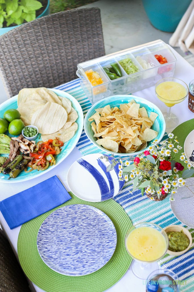 Blue, white and green tablescape with a taco bar.