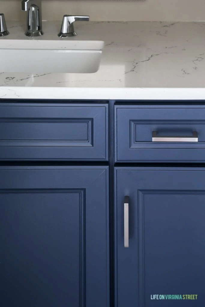 Thermofoil painted cabinets with Benjamin Moore Hale Navy paint.