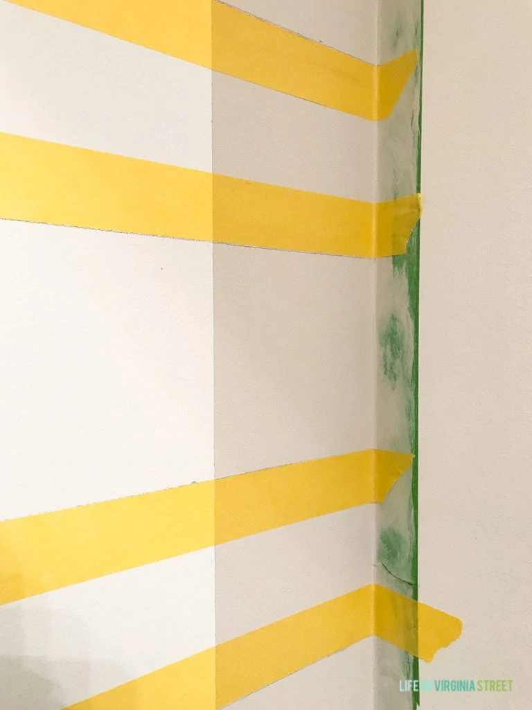 Yellow tape on wall horizontal.