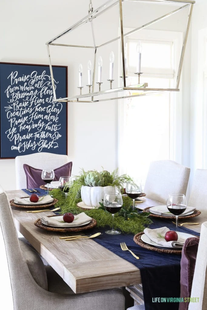 Olive, Plum and Artichoke tables cape with purple pillows on the chairs.