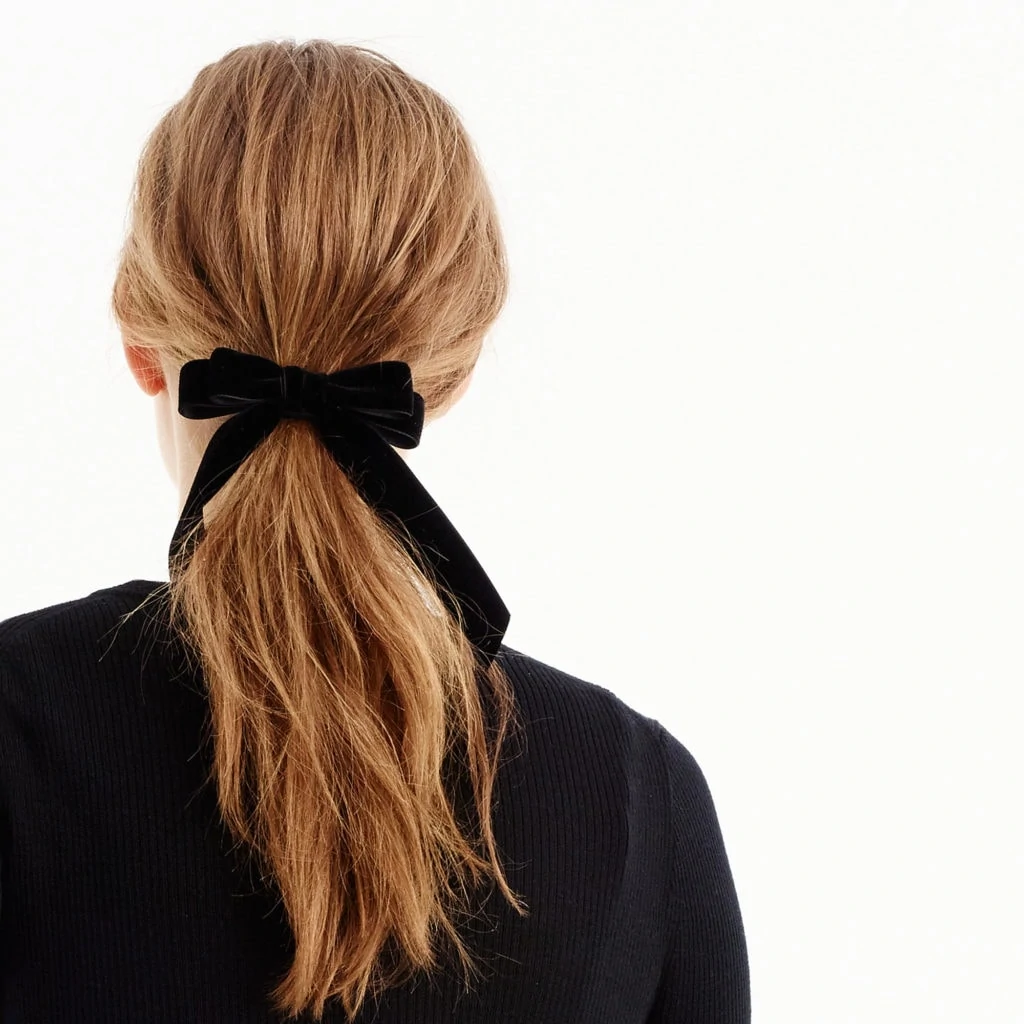 I love the classic look of this velvet hair tie. It dresses up any ponytail and comes in four colors including the black one shown here.