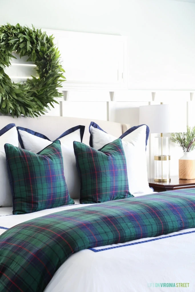 Classic Christmas bedroom with Williams Sonoma Home plaid tartan bedding in navy blue and green.