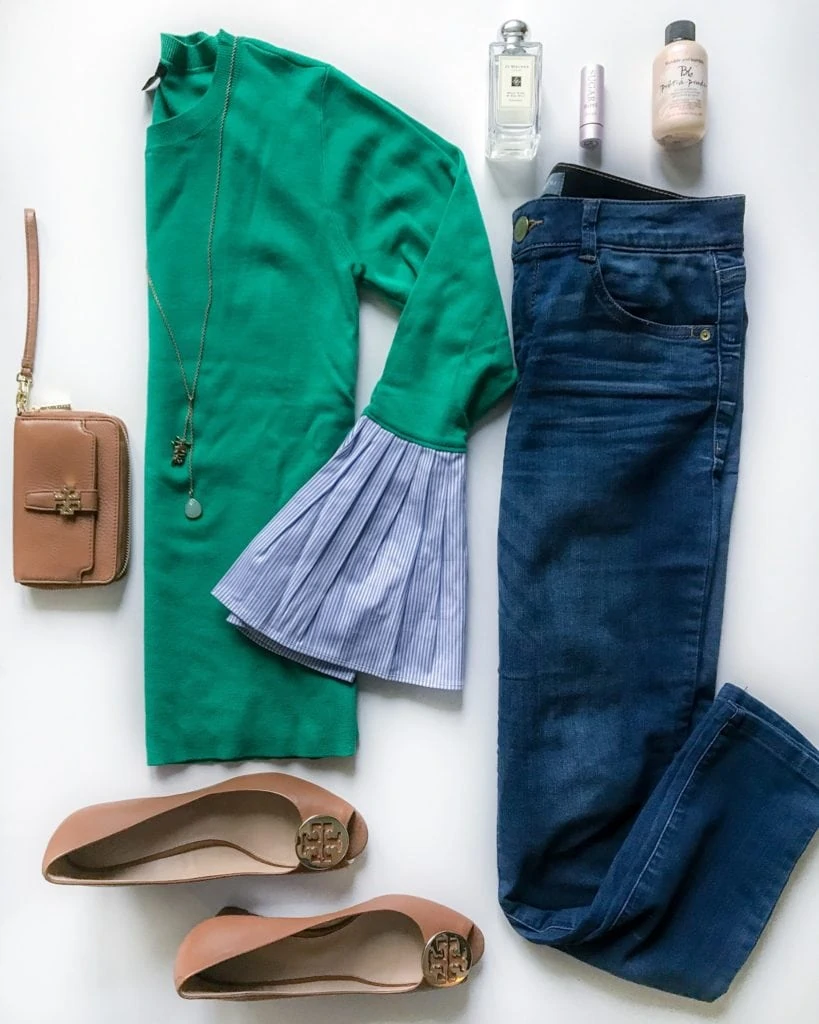 Green sweater with blue and white striped poplin sleeves, blue denim skinny jeans, came Tory Burch wedges, brown Tory Burch Wristlet, and the best perfume, lip condition and dry shampoo!