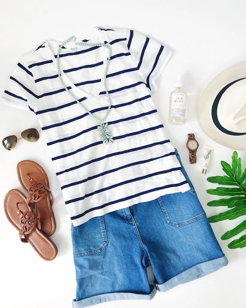 Blue and white striped v-neck tee shirt, denim shorts, wood watch, and leather sandals make for a cute spring or summer outfit with a beachy vibe!