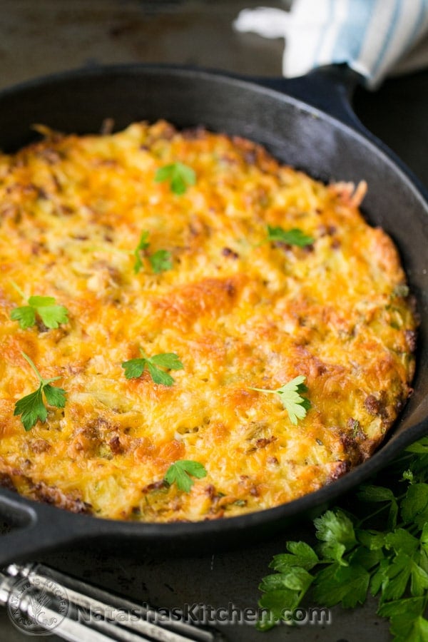 Cheesy skillet hash in a pan.
