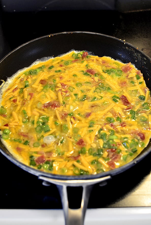 Egg green onions and cheese skillet breakfast.