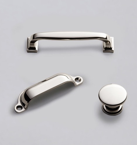 Silver bin and cupboard pulls.