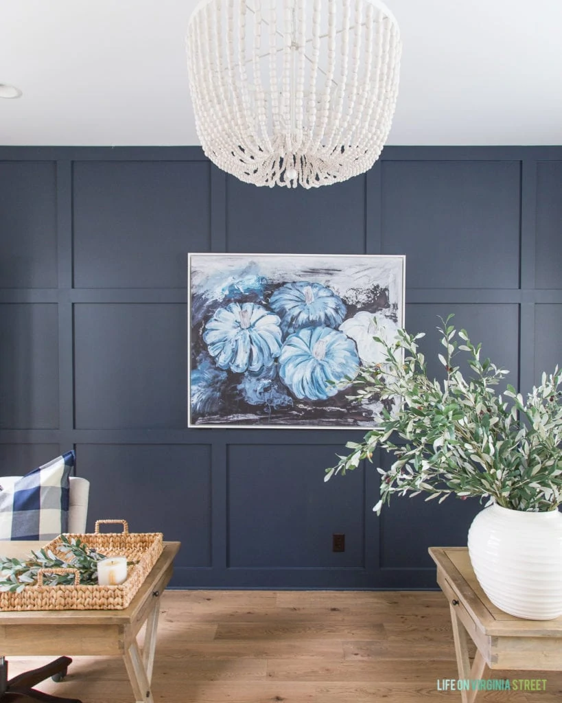 This gorgeous blue pumpkin abstract art, and beaded white chandelier.
