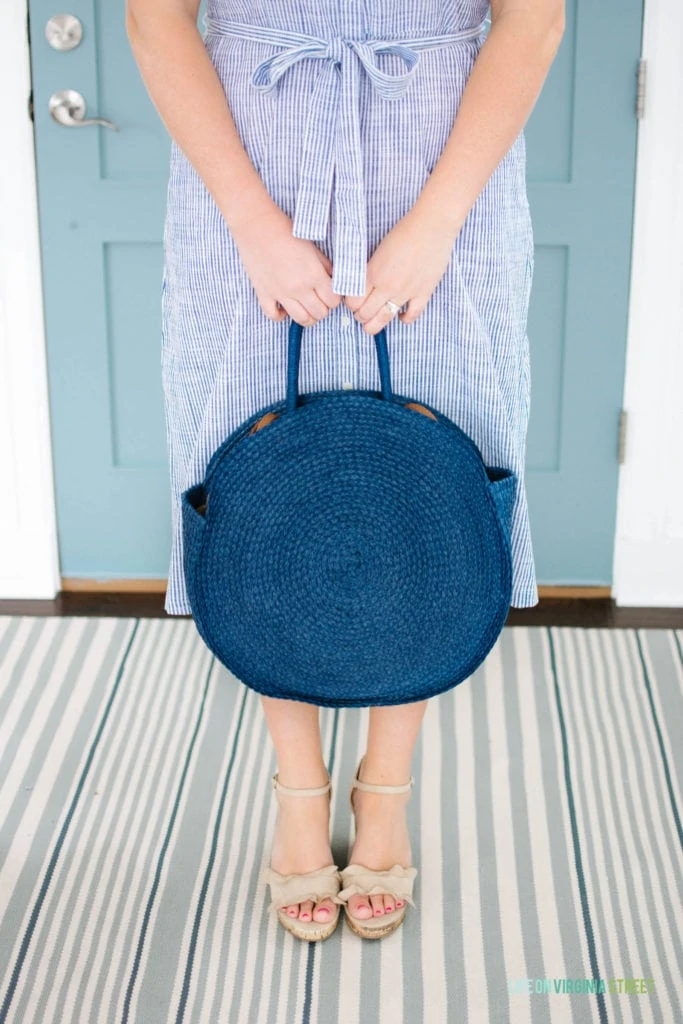 Cute outfit ideas for spring! I love this blue and white striped dress, blue raffia circle tote, and ruffled cork wedges! The perfect Easter outfit idea!