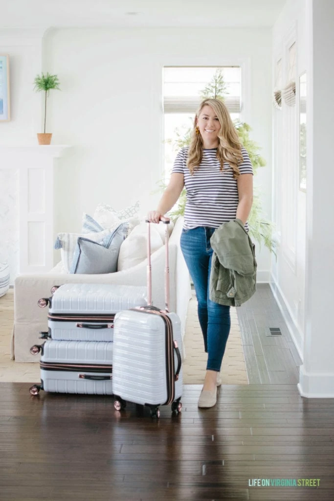 Cute travel day outfit ideas along with tips on how to pack a carry-on suitcase like a pro.