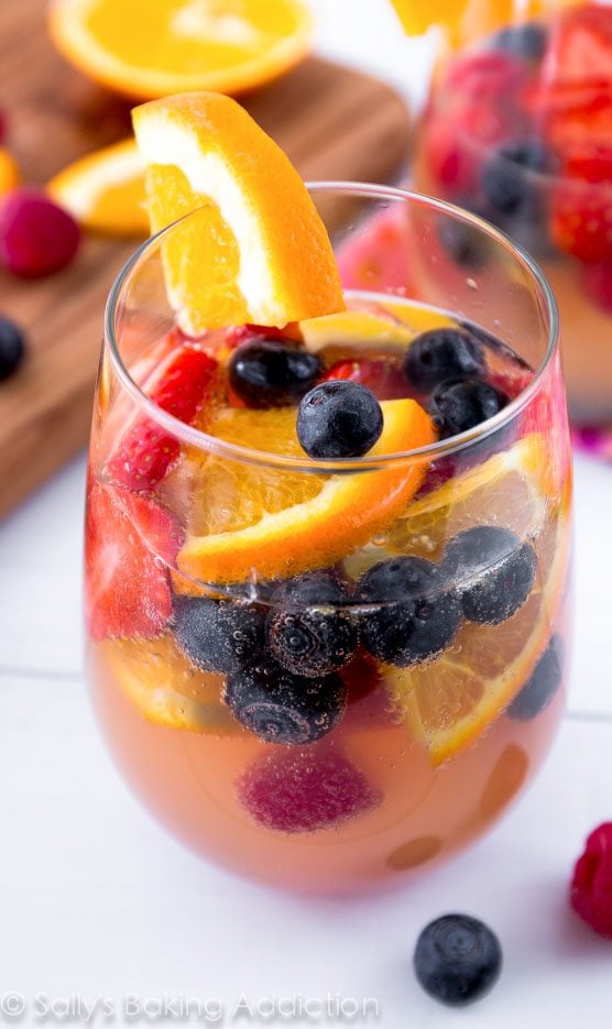 Champagne Sangria with berries in it.