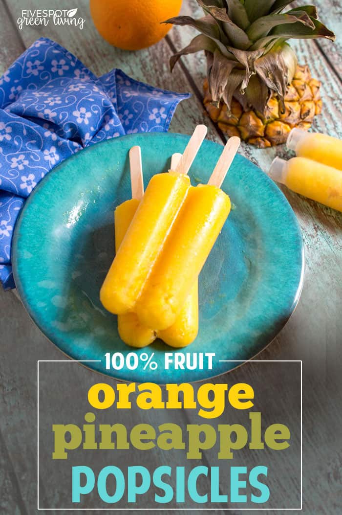 Orange Pineapple Popsicles on a blue plate.