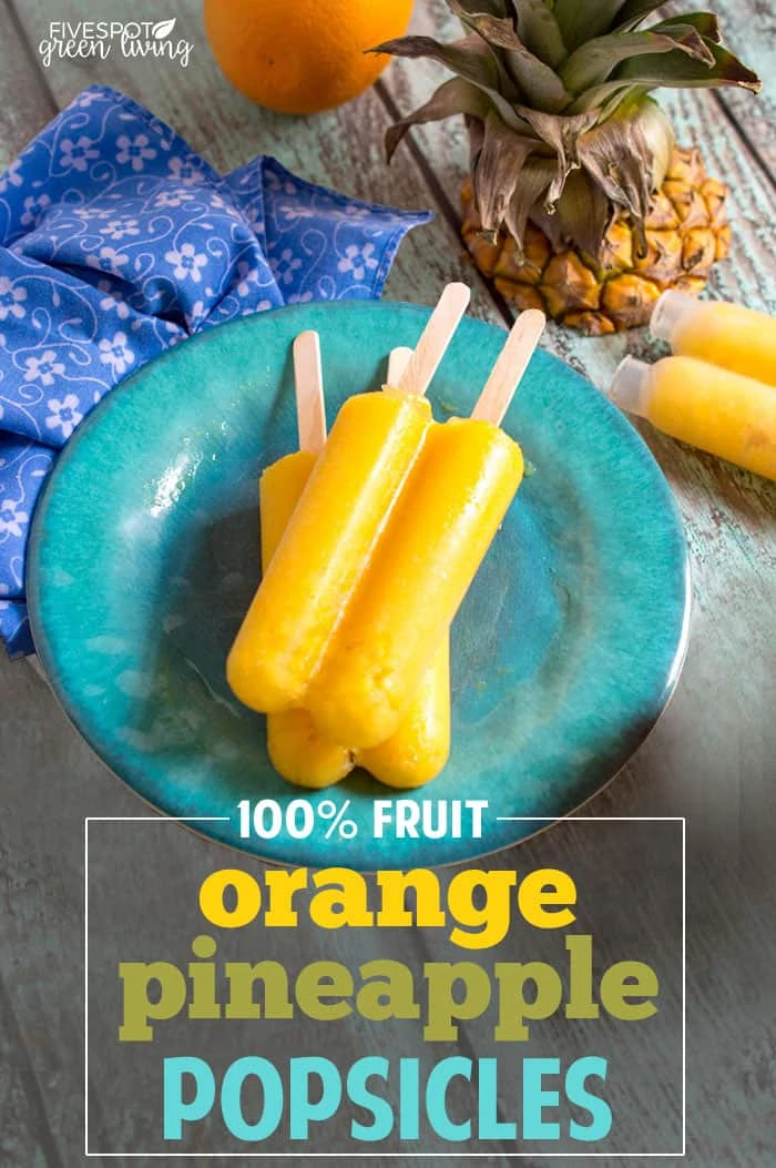 Orange Pineapple Popsicles on a blue plate.