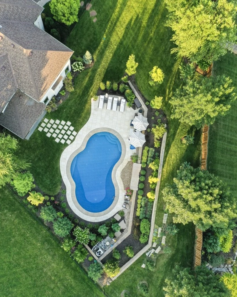 A backyard rendering with an inground pool.
