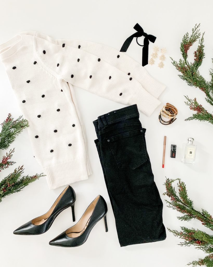 Pom pom sweater in black and white, black denim, velvet hair tie and red lips!