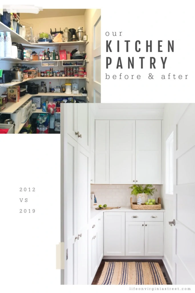 The kitchen pantry painted a bright white with cupboards with doors that close.