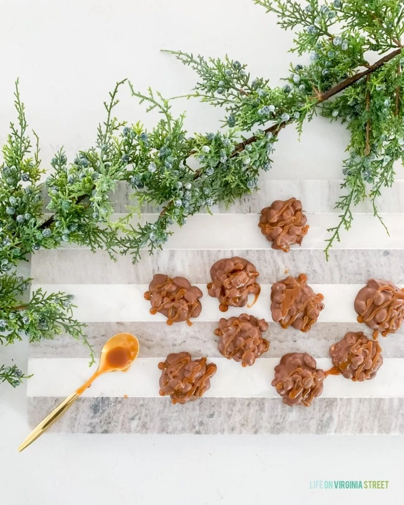 Chocolate peanut clusters on the table.