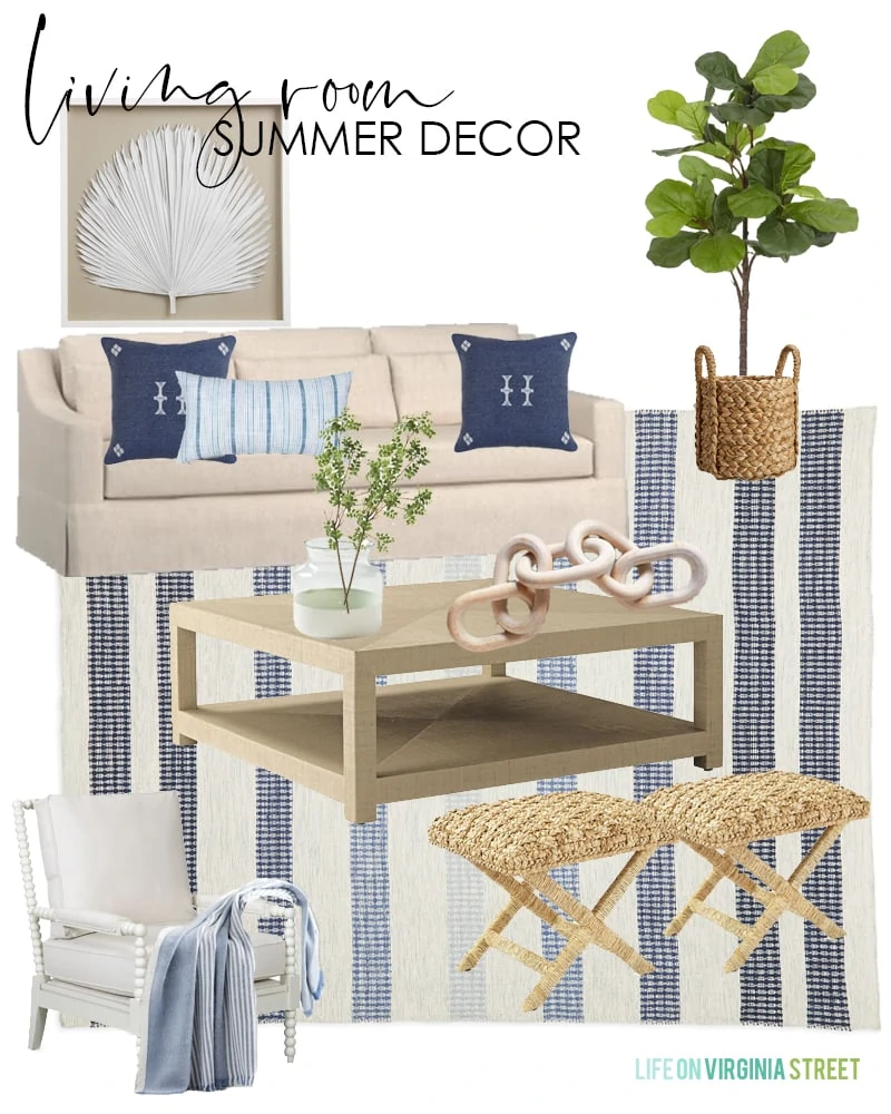 Summer decorating ideas for a living room with a linen sofa, raffia coffee table, blue striped rug, natural woven benches, white spindle chairs, palm art, and blue pillows.