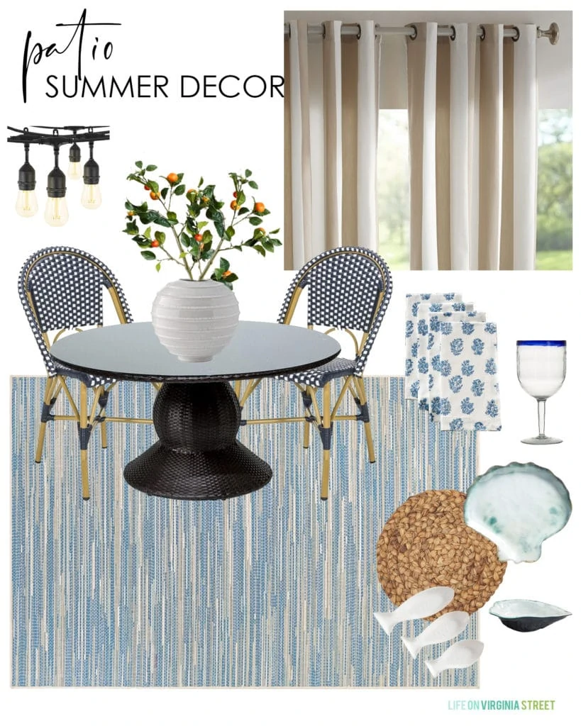 Summer decorating ideas for a patio with a round table, blue rug, striped outdoor curtains, string lights and coastal inspired dinnerware.