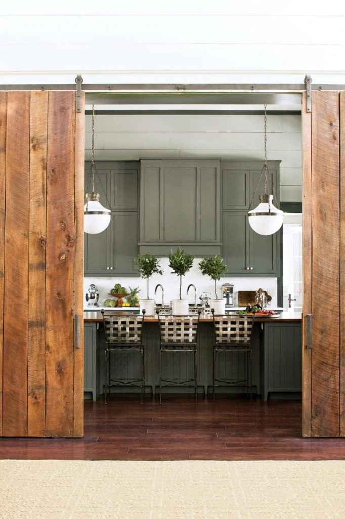 Sherwin Williams Pewter Green kitchen cabinets via Southern Living