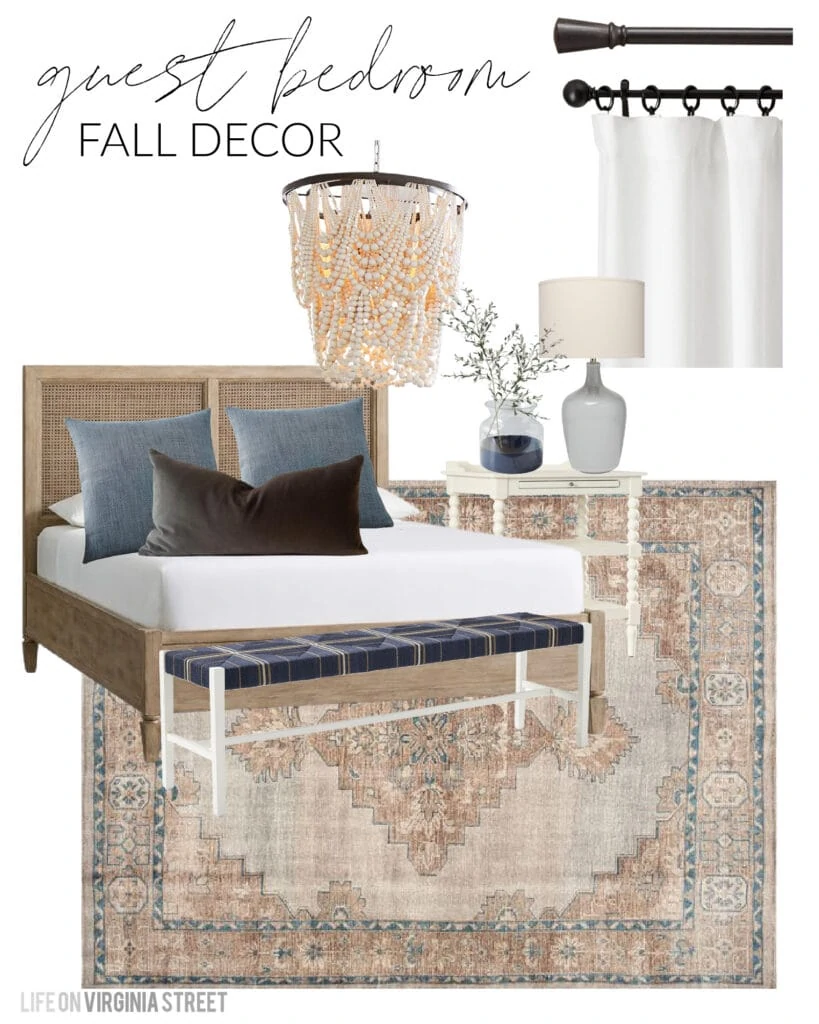 Guest bedroom design board for fall with a wood cane bed, navy blue woven bench, vintage style rug, blue linen pillows, brown velvet pillow, white linen drapes, white spindle nightstand, and a wood bead chandelier.