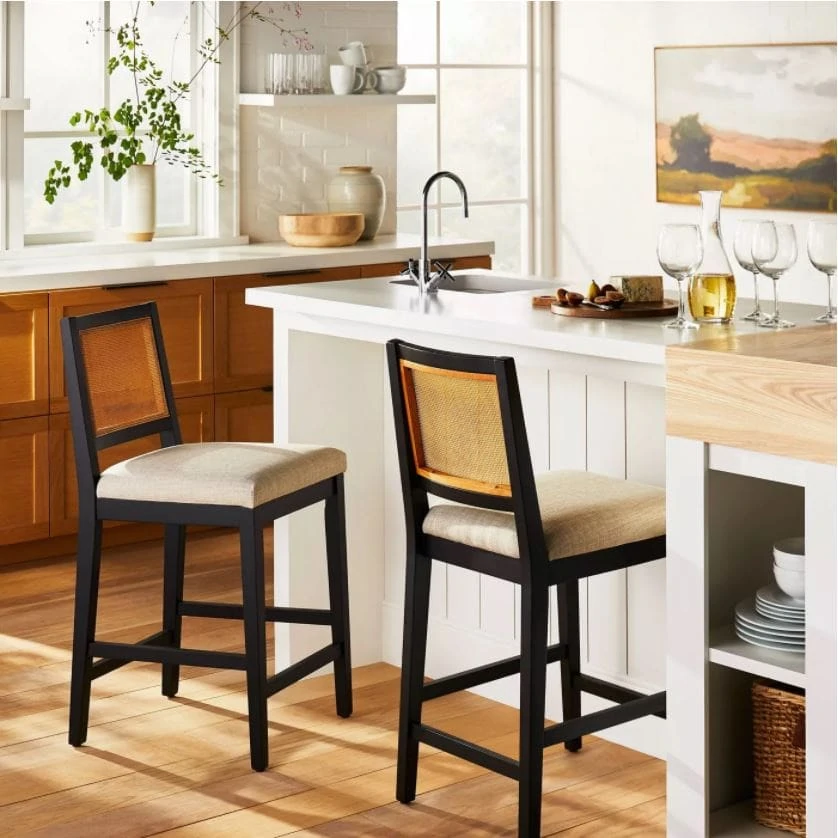Gorgeous cane barstools from the new Studio McGee fall collection at Target! Styled in a kitchen with a white island and wood cabinets.